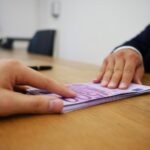 Grafica illustrativa sul funzionamento del cashback fiscale 2026 e potenziali risparmi.